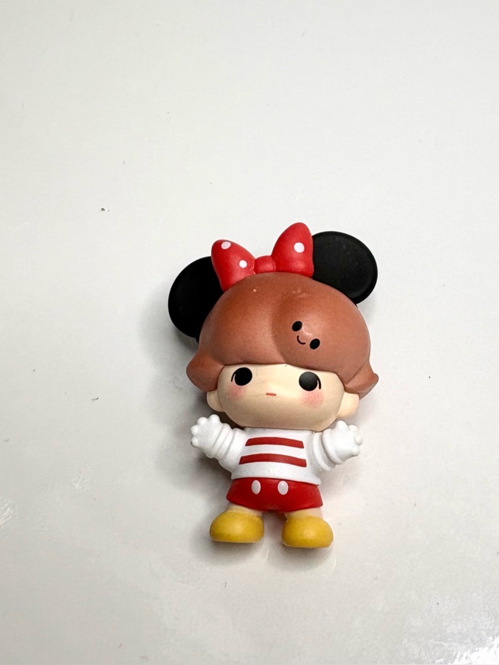 Pop bean Disney Dimoo featuring “Hugging Minnie Mouse.”
